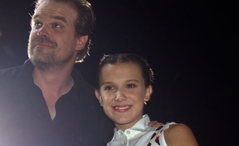 David Harbour And Millie Bobby Brown Meet At Red Carpet Event For Netflix’s Final Season Of ‘Stranger Things’ Following Brown’s Alleged Claims Against Harbour For Bullying And Harassment
