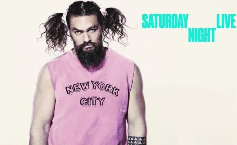 Jason Momoa Host ‘Saturday Night Live’ and Plays a Flirty Pilot in Thanksgiving Day Parade Airport Sketch